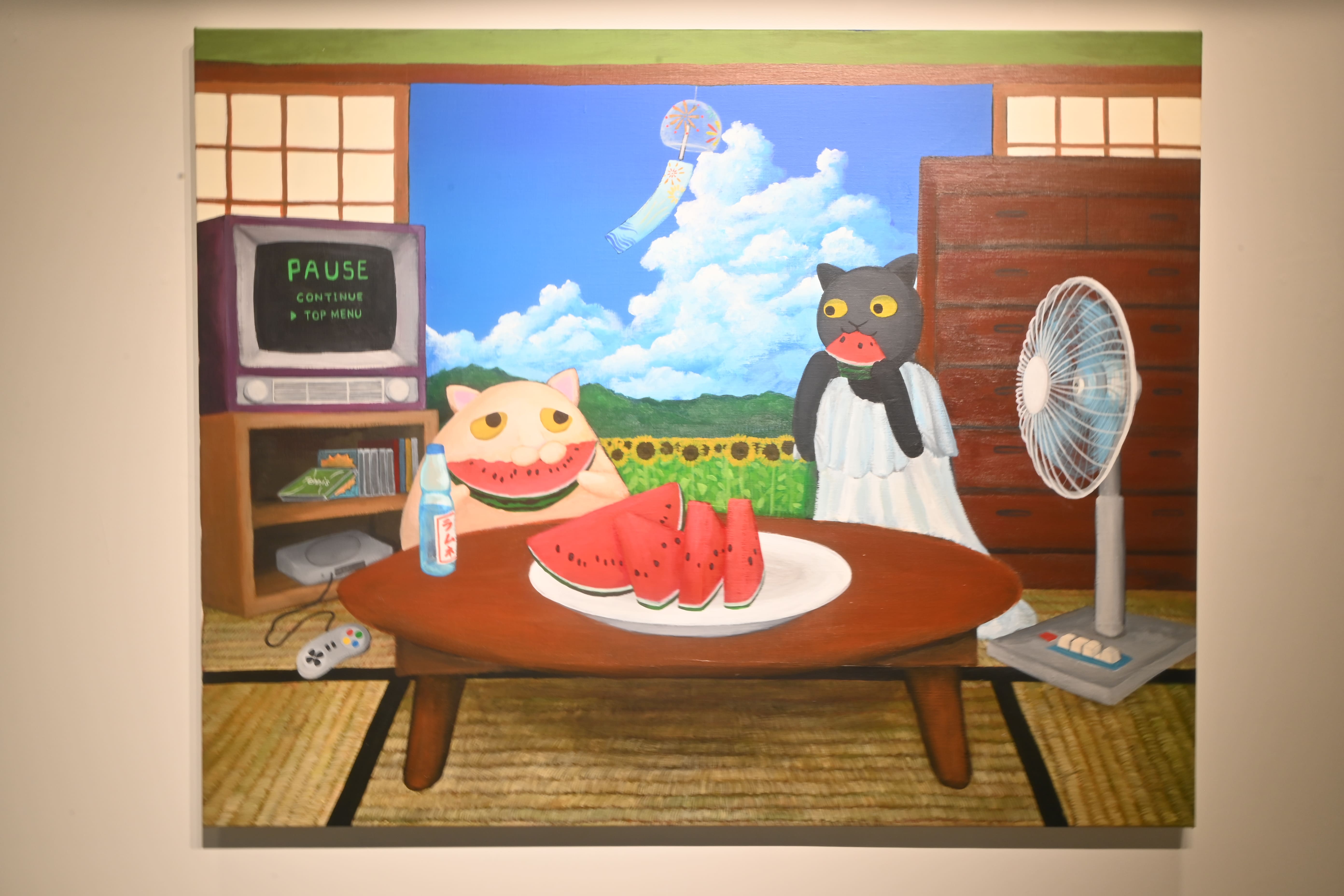 〈冷たいごちそう〉細緻的呈現鄉村和室中的細節，並以貓咪吃西瓜的舉動傳遞夏日風情。　圖／王翊丞攝